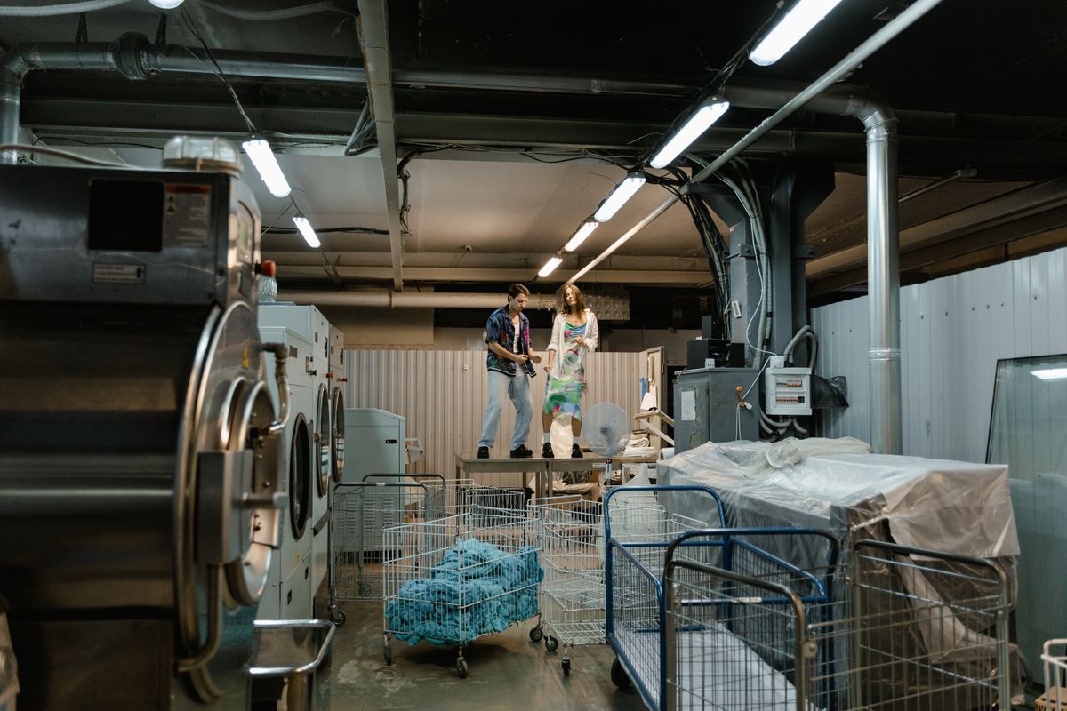 Laundry team working in a professional laundry facility